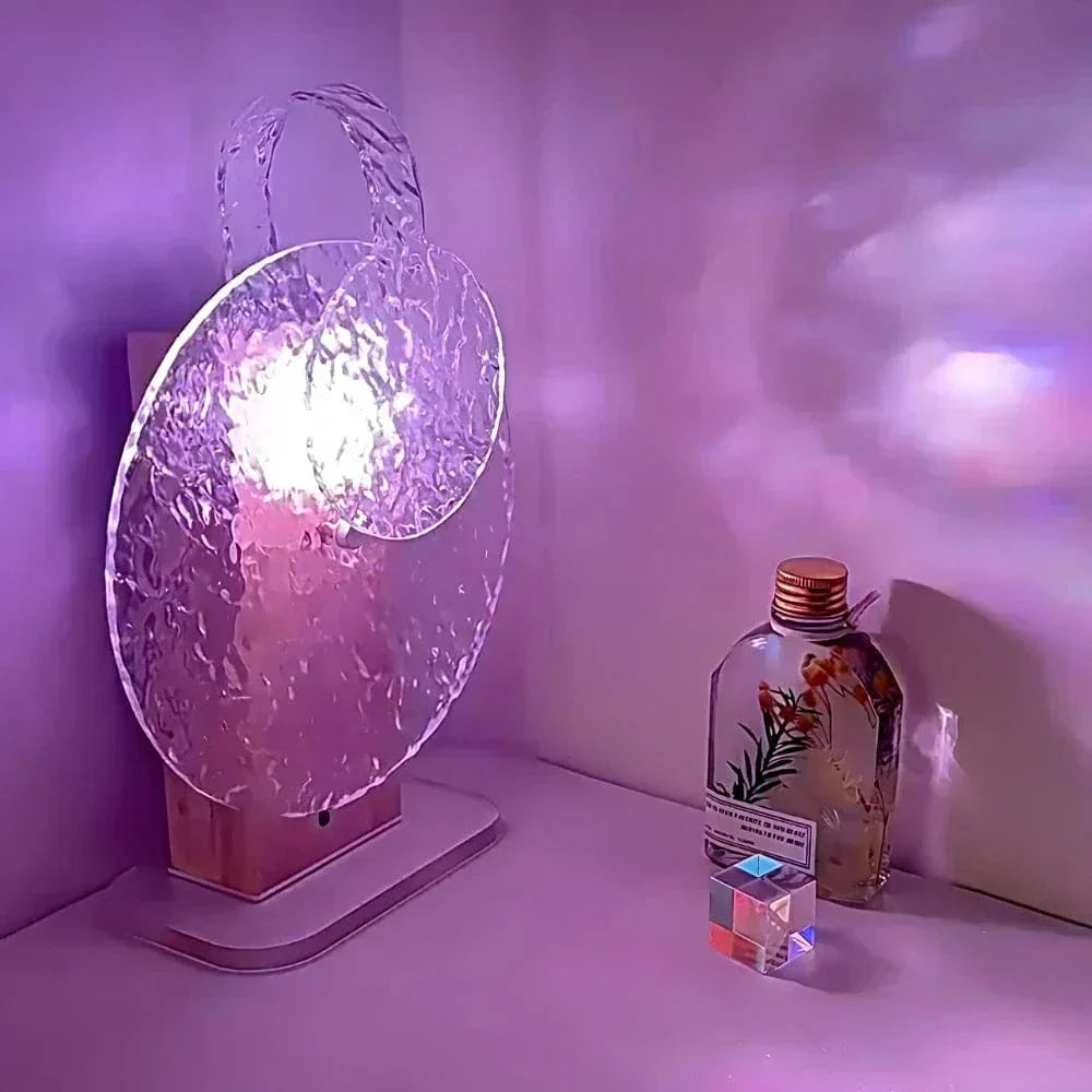 "Rechargeable LED lamp projects sunset hues, ocean waves; adds cozy ambiance to home decor with adjustable head."