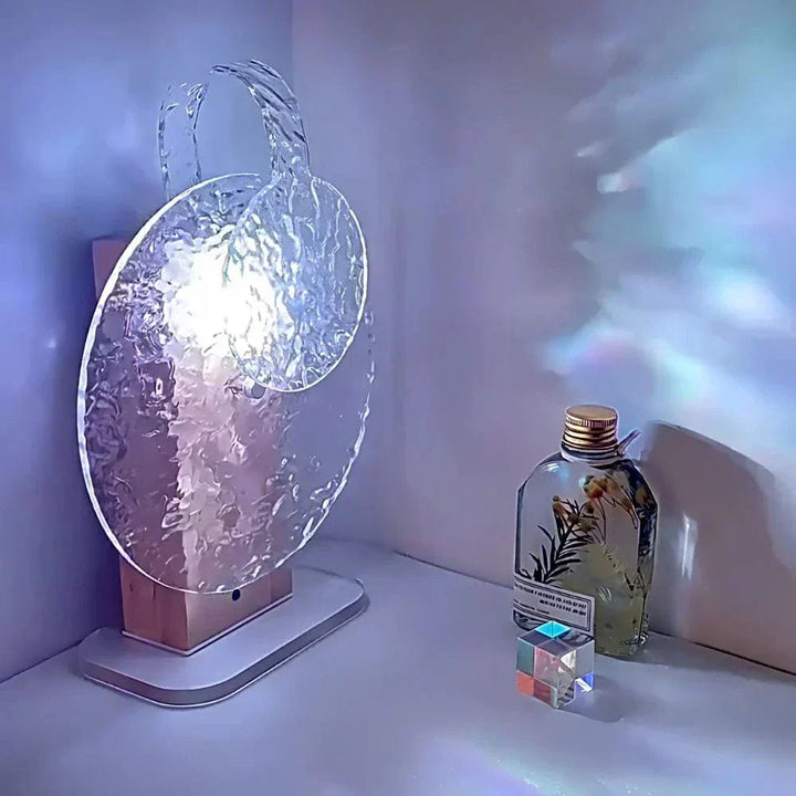"Rechargeable LED lamp projects sunset hues, ocean waves; adds cozy ambiance to home decor with adjustable head."