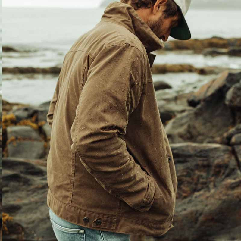 "Rugged deep brown men's utility jacket, front view, with practical pockets, ideal for autumn urban and countryside use."