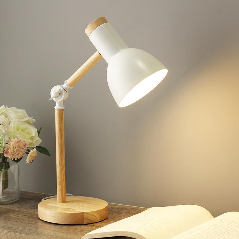 Scandinavian wooden desk lamp with foldable design, colorful shade, adjustable height, and sturdy base. Ideal for any decor.
