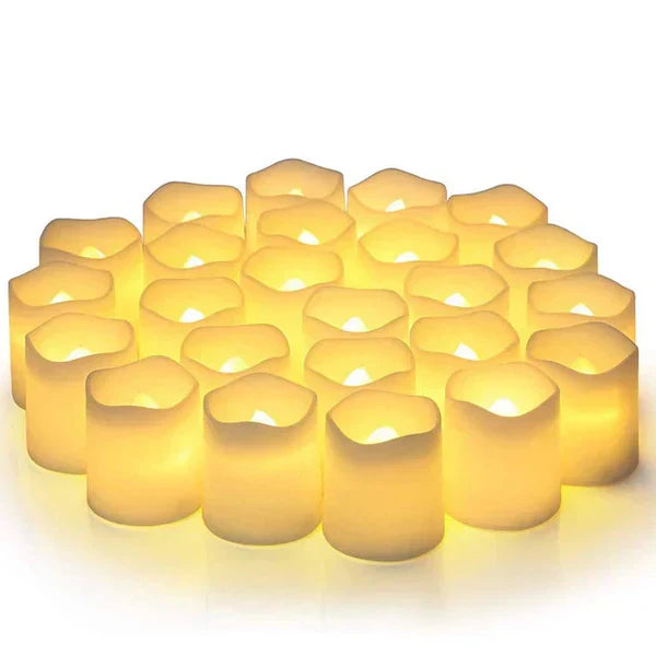 Safe, battery-operated GlowFlicker set of 24 LED flameless candles. Realistic warm white glow for any decor.