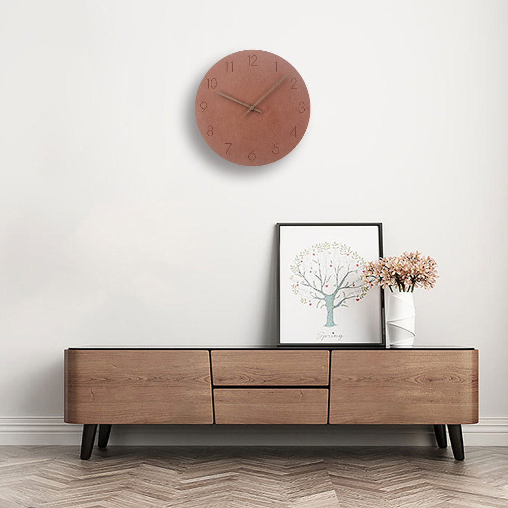 "Silent Scandinavian wall clock with minimalist design, natural wood finish, enhancing elegant home décor"