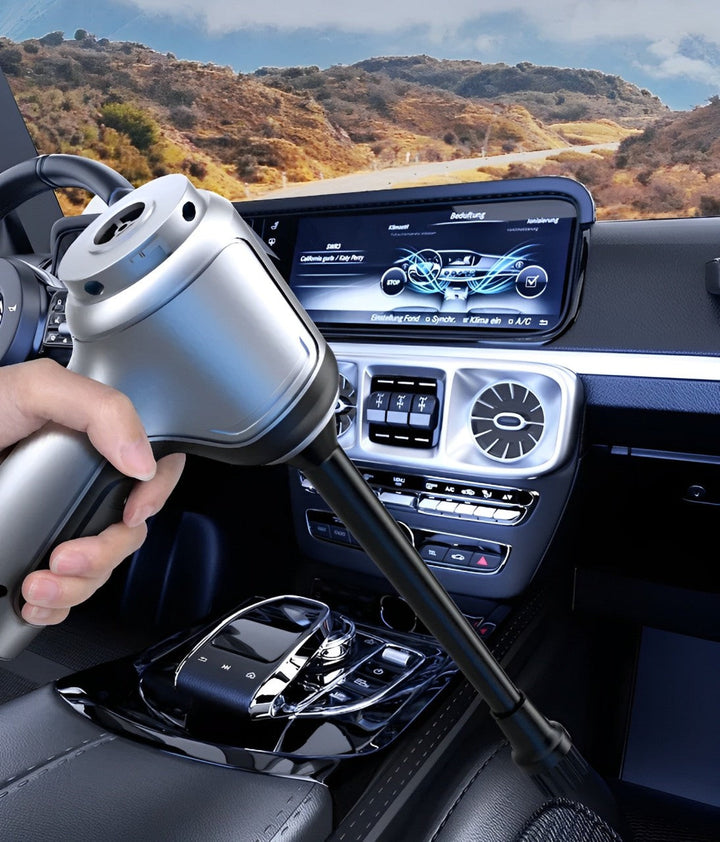 "Silver cordless car vacuum cleaner with 95000Pa suction, sleek and lightweight for efficient car and home cleaning."