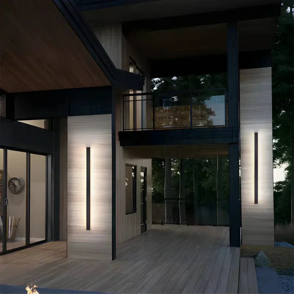 Sleek aluminium outdoor wall sconce with backlit design, ideal for modern patios; corrosion-resistant and stylish.