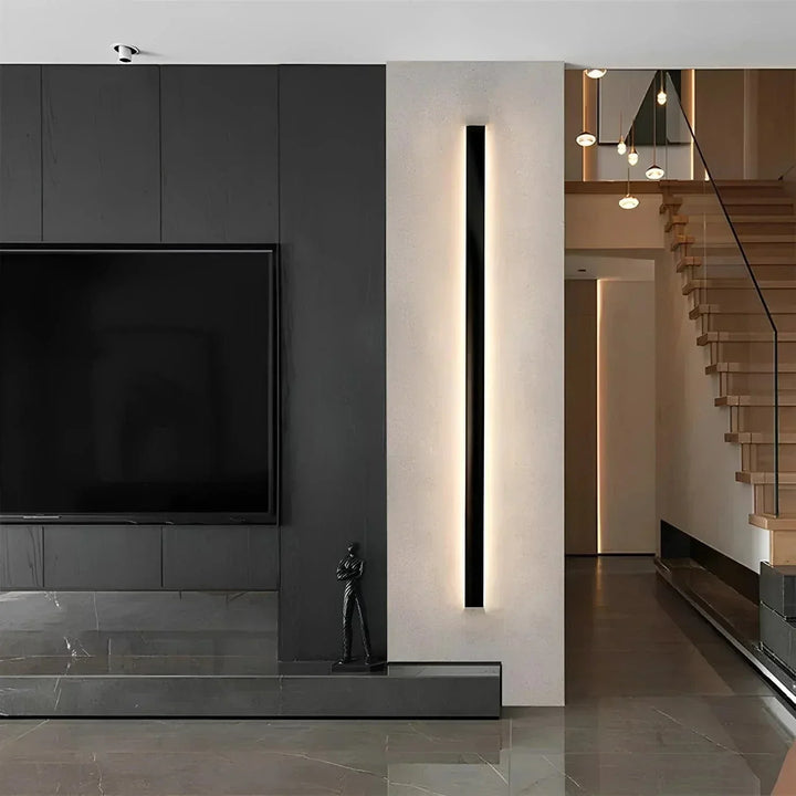Sleek aluminium outdoor wall sconce with backlit design, ideal for modern patios; corrosion-resistant and stylish.