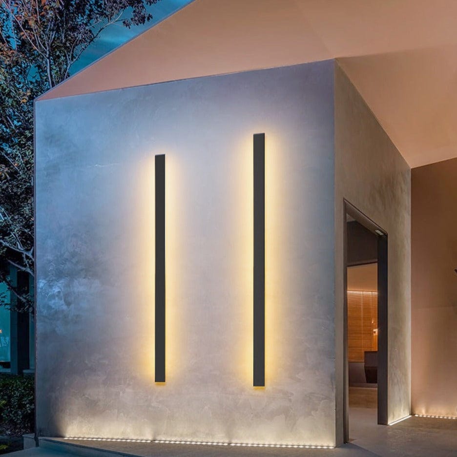 Sleek aluminium outdoor wall sconce with backlit design, ideal for modern patios; corrosion-resistant and stylish.