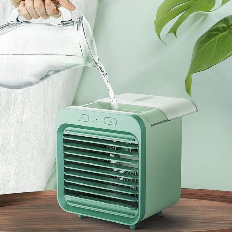 "Sleek, compact portable air conditioner with adjustable cooling, ideal for small spaces and seamless modern design integrati
