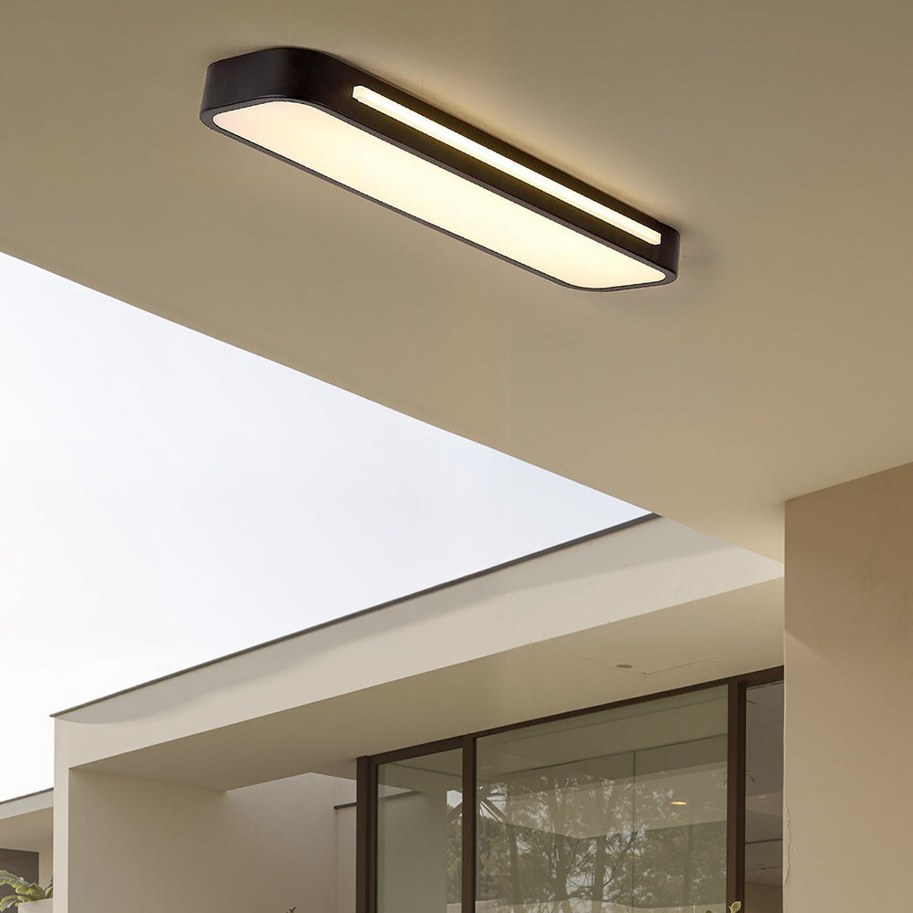 "Sleek minimalist linear LED ceiling light with iron and acrylic design, perfect for modern homes, available in three sizes."