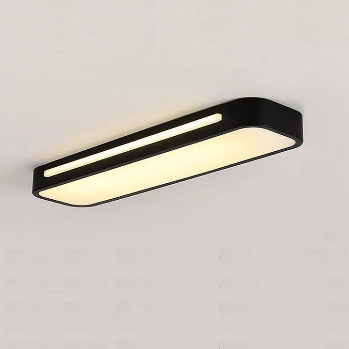 "Sleek minimalist linear LED ceiling light with iron and acrylic design, perfect for modern homes, available in three sizes."