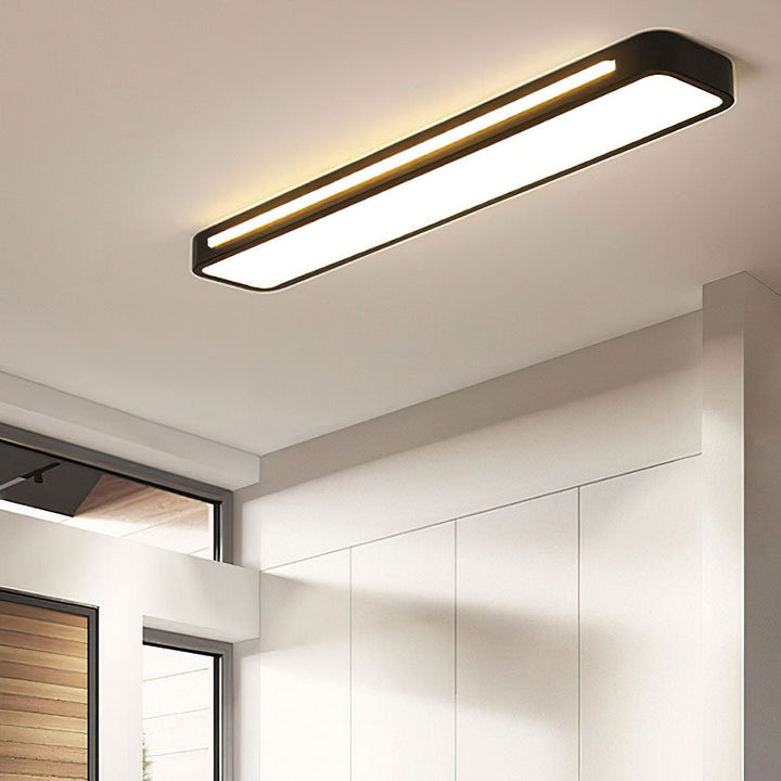 "Sleek minimalist linear LED ceiling light with iron and acrylic design, perfect for modern homes, available in three sizes."
