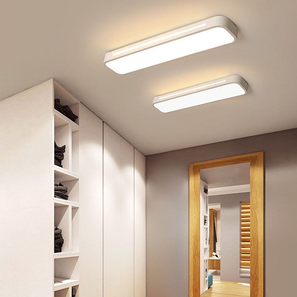 "Sleek minimalist linear LED ceiling light with iron and acrylic design, perfect for modern homes, available in three sizes."