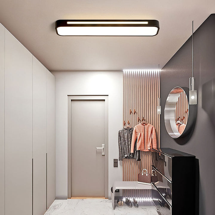"Sleek minimalist linear LED ceiling light with iron and acrylic design, perfect for modern homes, available in three sizes."