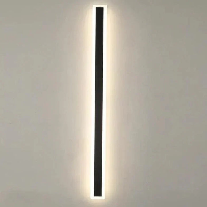 Sleek modern outdoor LED wall light with black frame and white acrylic, ideal for stylish patio illumination. Dimmable featur