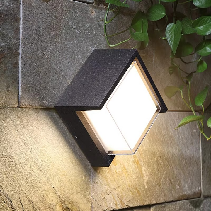 Sleek outdoor wall lamp with motion sensor and LED light, featuring IP65 waterproof rating and minimalist geometric design.