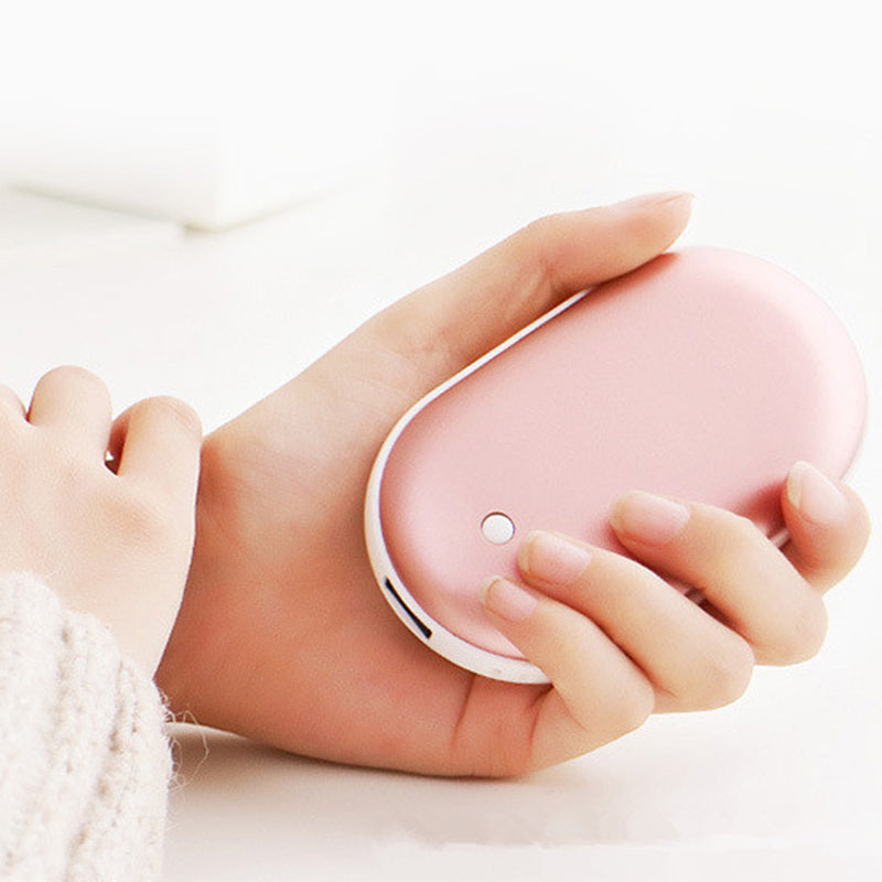 "Sleek silver portable USB hand warmer and powerbank, compact size, double-sided heating, ideal for chilly outdoor use."