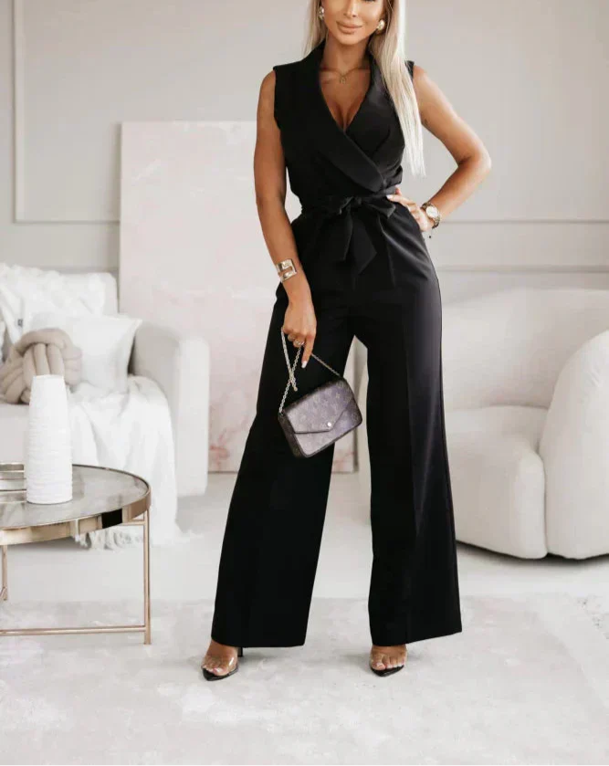 "Sleeveless wide-leg jumpsuit for women in black and pink with wrap design, perfect for versatile elegant occasions."