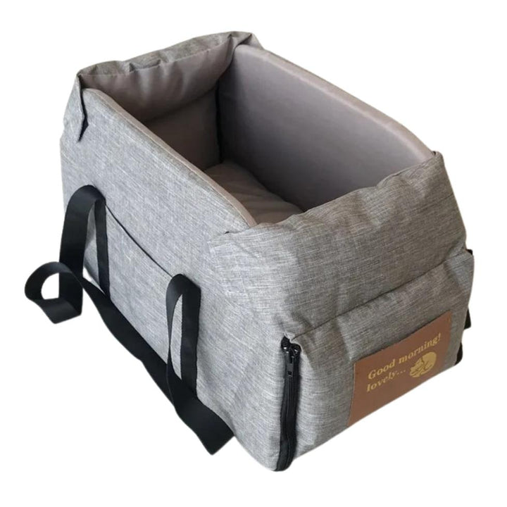 "Small Dog Cosy Car Seat Carrier Basket with padded interior, sleek design, fits securely in car for safe pet travel."
