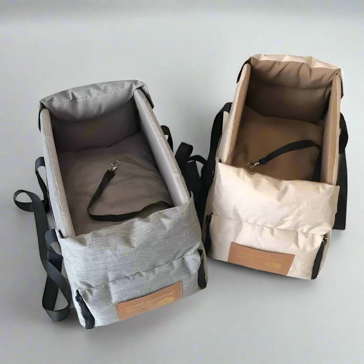 "Small Dog Cosy Car Seat Carrier Basket with padded interior, sleek design, fits securely in car for safe pet travel."