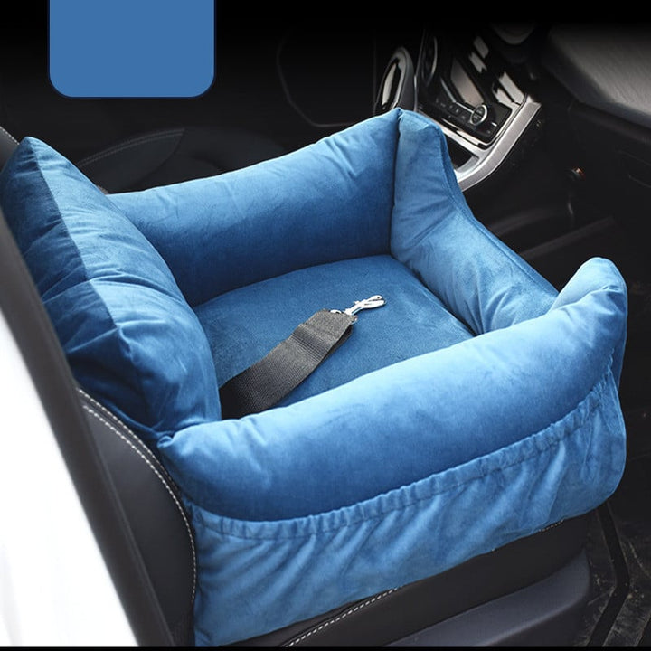 "Soft, padded pet car seat cover for dogs and cats. Features adjustable straps, fits most vehicles for safe, comfy travel."