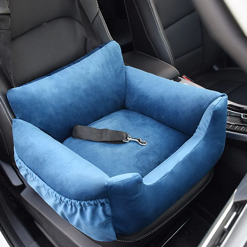 "Soft, padded pet car seat cover for dogs and cats. Features adjustable straps, fits most vehicles for safe, comfy travel."