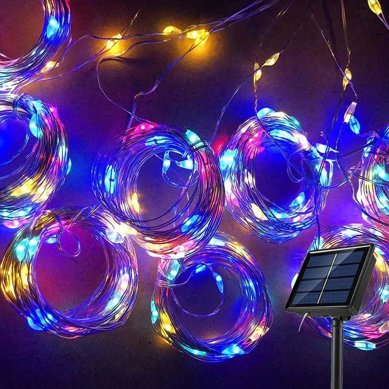 "Solar LED curtain light with copper wire, ideal for events, featuring warm white LEDs and solar power, outdoor use."