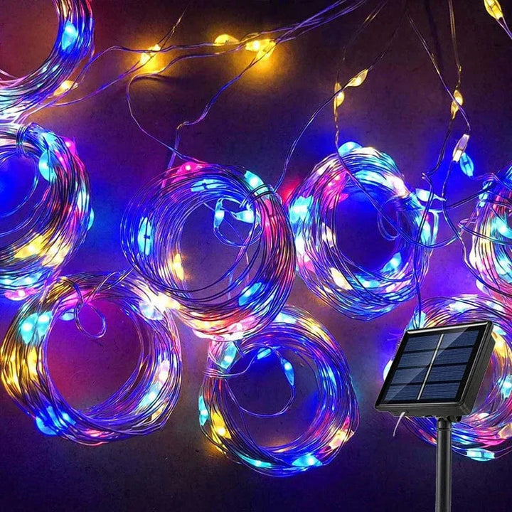 "Solar LED curtain light with copper wire, ideal for events, featuring warm white LEDs and solar power, outdoor use."