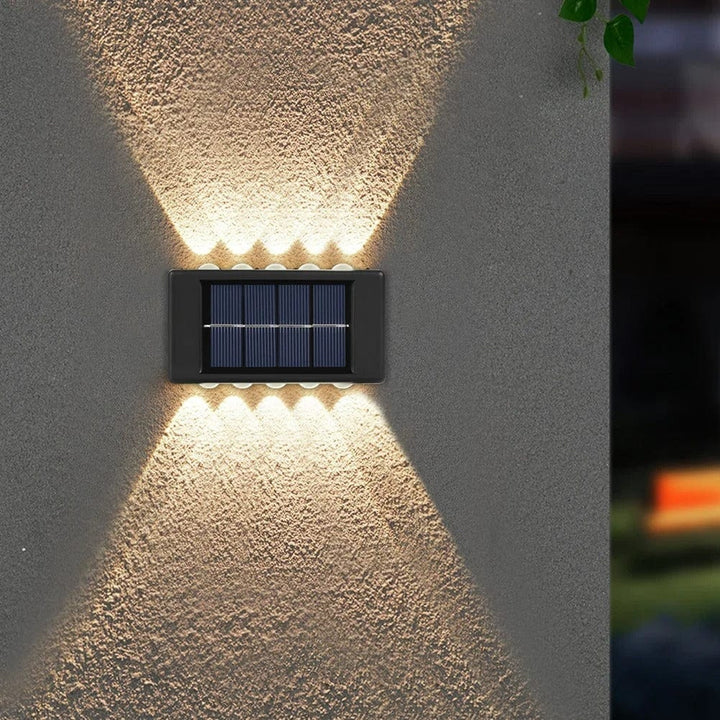Solar LED Outdoor Wall Light, IP65 waterproof, warm white glow, durable ABS, eco-friendly for gates, doorways, patios.