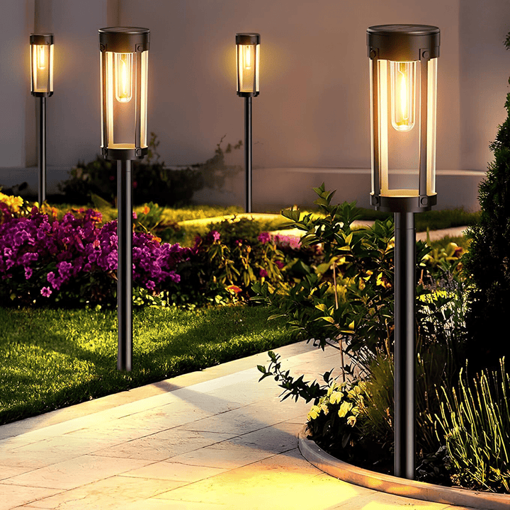 Solar-powered waterproof garden torch with flickering glow, decorative design, illuminating gardens, patios, and pathways.