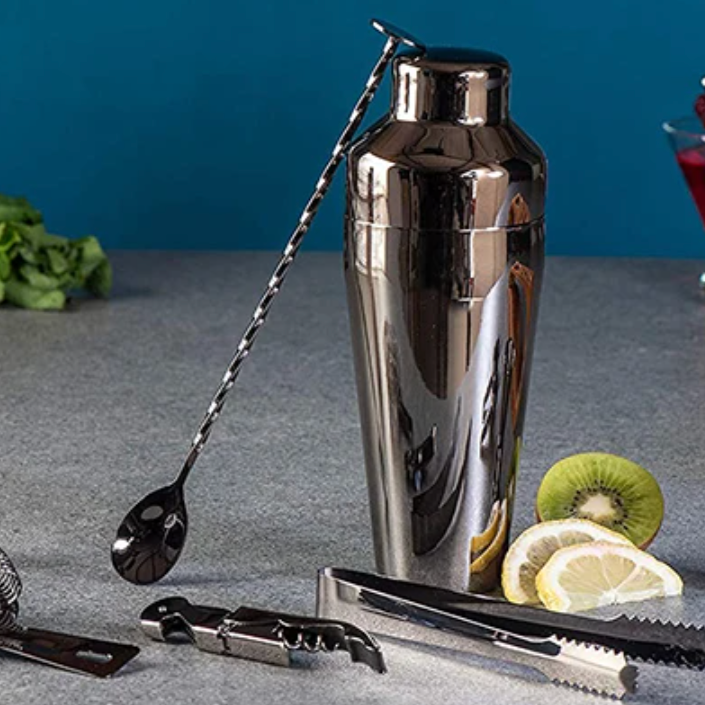 Sophisticated 10-piece stainless steel cocktail set with shaker, jigger, spoon, muddler, pourers, tongs, and storage stand.