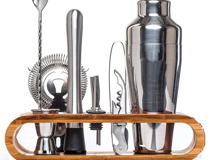 Sophisticated 10-piece stainless steel cocktail set with shaker, jigger, spoon, muddler, pourers, tongs, and storage stand.