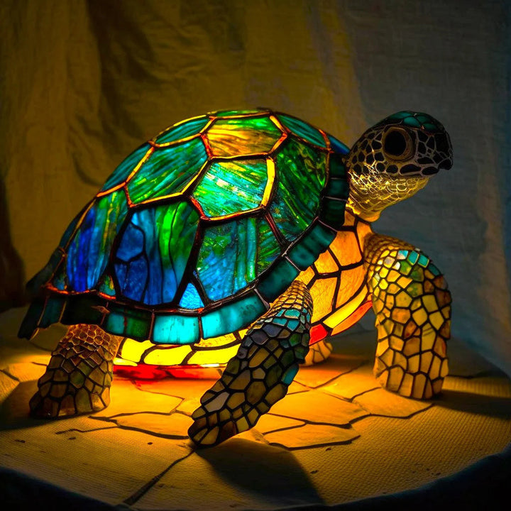 Table lamp with stained glass animal design, a decorative resin lamp perfect for home accent lighting.