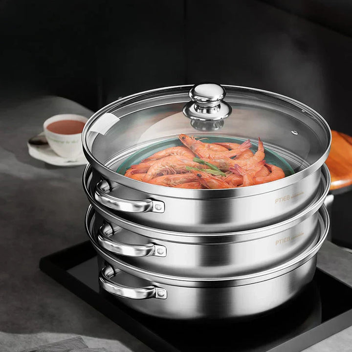 "Stainless steel 3-tier steamer with glass lid and handles, ideal for healthy cooking, steaming vegetables, fish, and dumplin