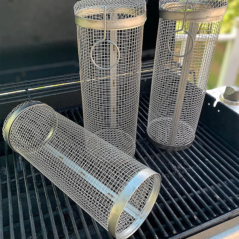 "Stainless steel BBQ rolling basket with mesh design for even grilling, shown with food; essential for outdoor cooking."