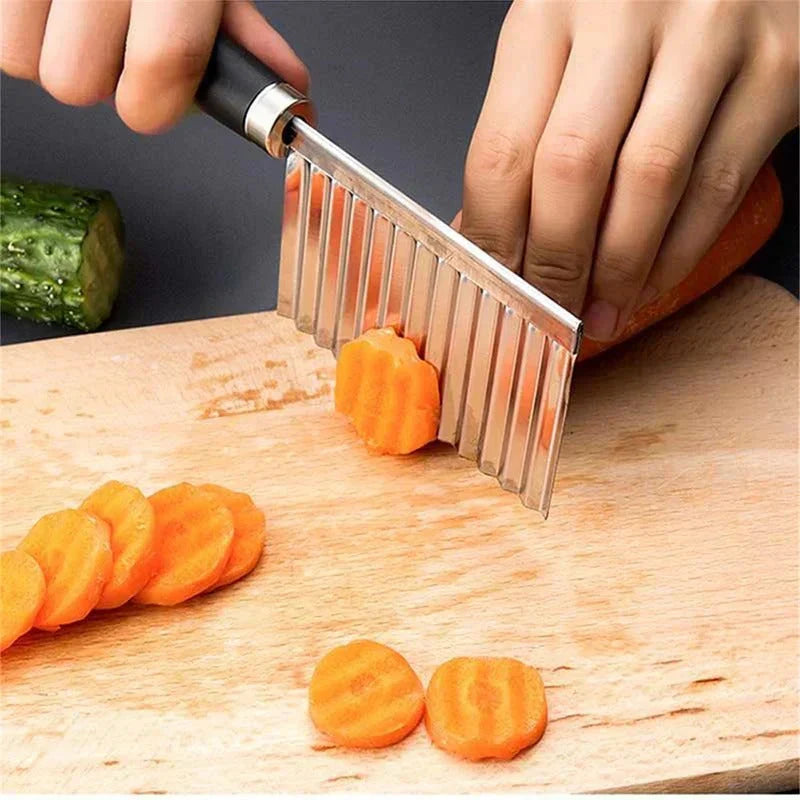 "Stainless steel crinkle cutter knife with a sleek blade, perfect for slicing vegetables and fruits with ergonomic handle."