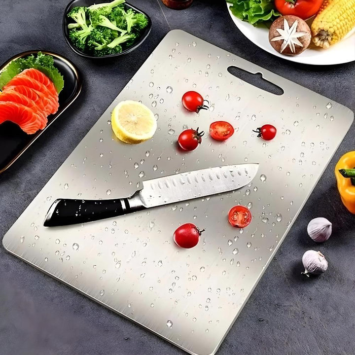 "Stainless steel cutting board, non-slip, scratch-resistant surface for hygienic food prep, sleek design for kitchen use."