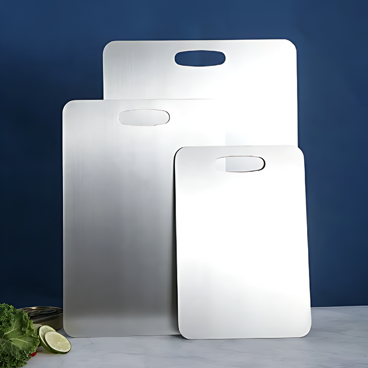 Stainless steel kitchen cutting board with sleek anti-microbial surface, perfect for durable and hygienic cooking prep.