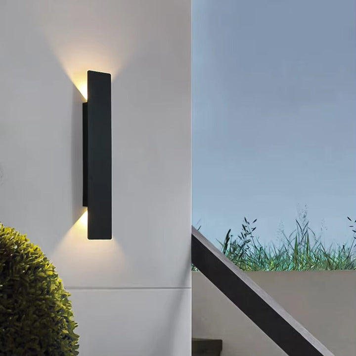 "Stylish outdoor waterproof LED wall light, rectangle design, up/down illumination, modern look, IP65 for durability."