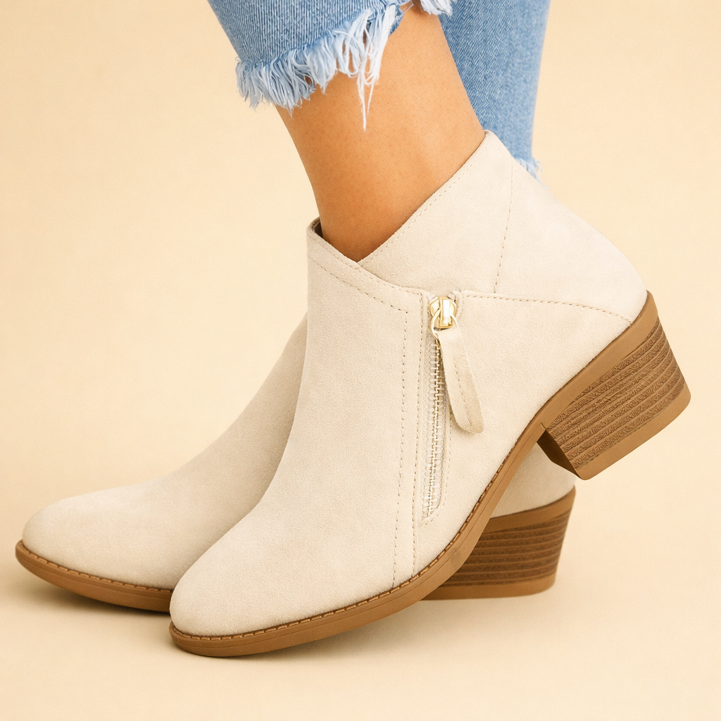 Elegant white women's zipper ankle boots, a chic choice for fall fashion & everyday wear.