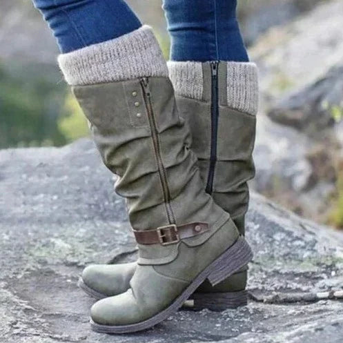 Stylish women's knee-high buckle boots in synthetic suede with cozy knit cuff, perfect for autumn fashion.