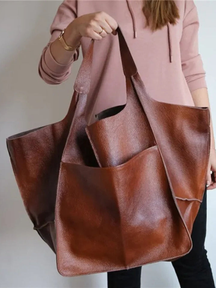 Versatile women's shoulder tote bag, a stylish and spacious accessory for any occasion.