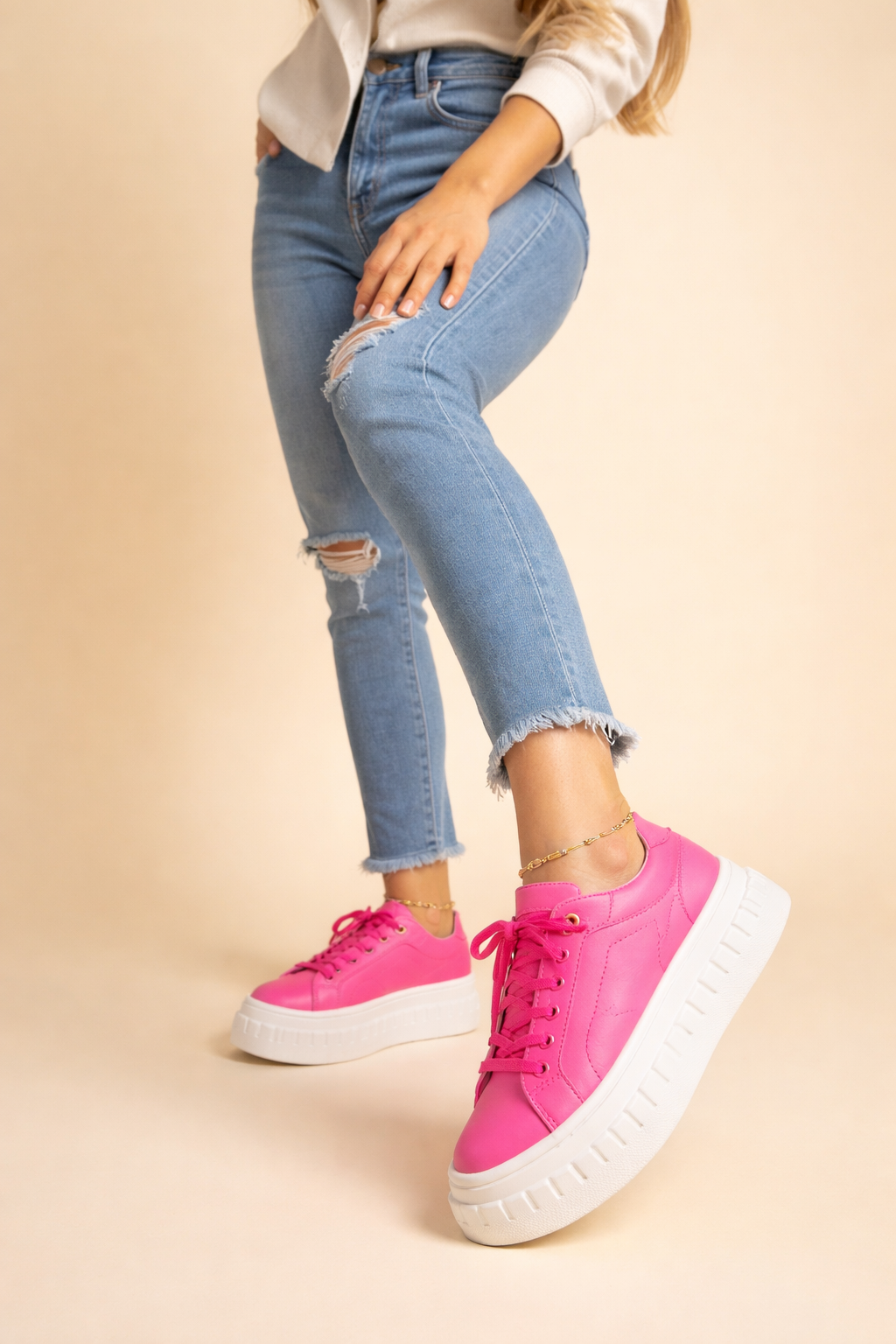 Modern women's plateau sneakers. Provides elevated style and all-day comfort for a trendy, casual chic look.