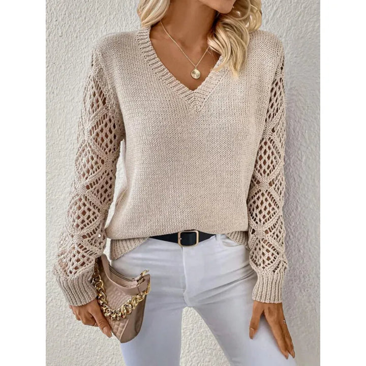 Trendy women's knit V-neck top with stylish open sleeves. A comfortable and versatile pullover for fall/winter.