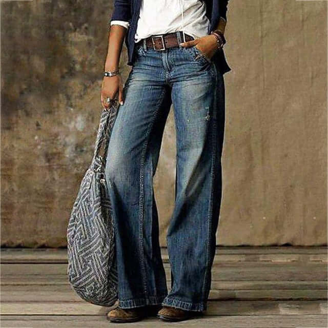 High-waisted flowy wide leg flared trousers for women, offering a comfortable and versatile addition to spring/summer fashion.