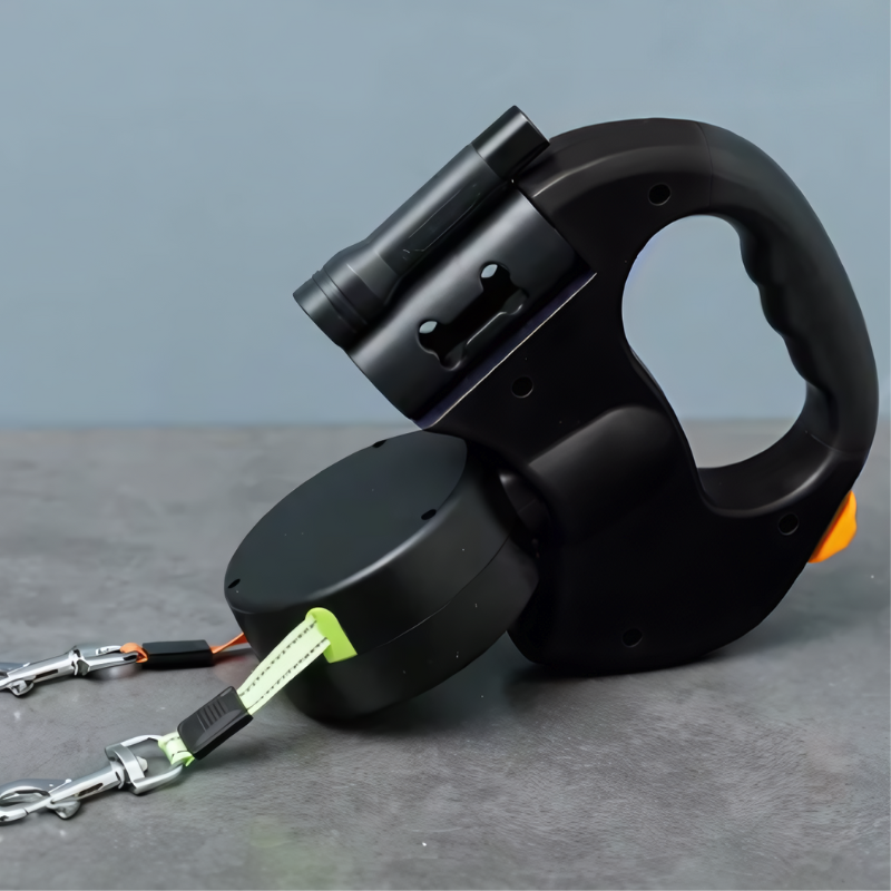 "Tangle-free dual dog leash with ergonomic grip and LED light, shown in black and red, ideal for safe night walks."