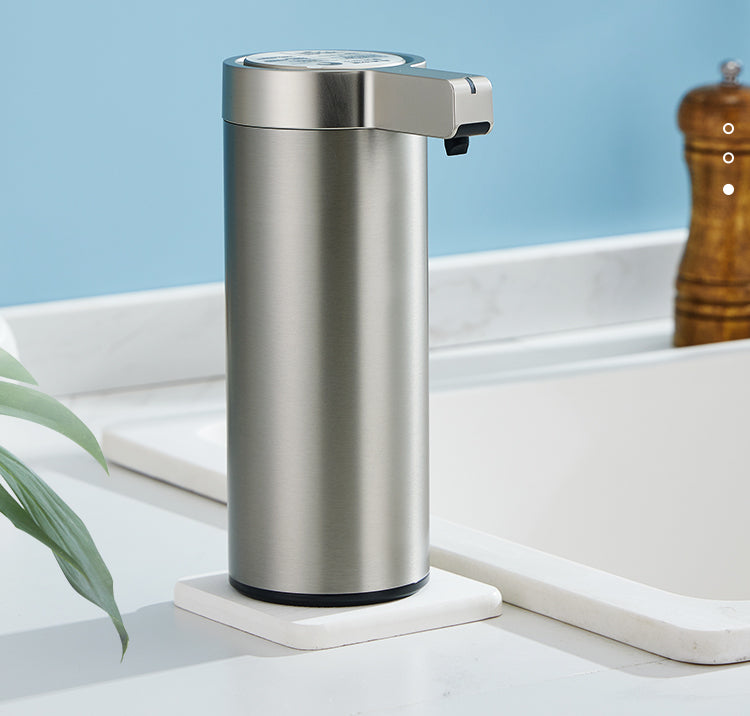 Touchless stainless steel soap dispenser with sleek design and motion sensor, suitable for kitchen and bathroom use.