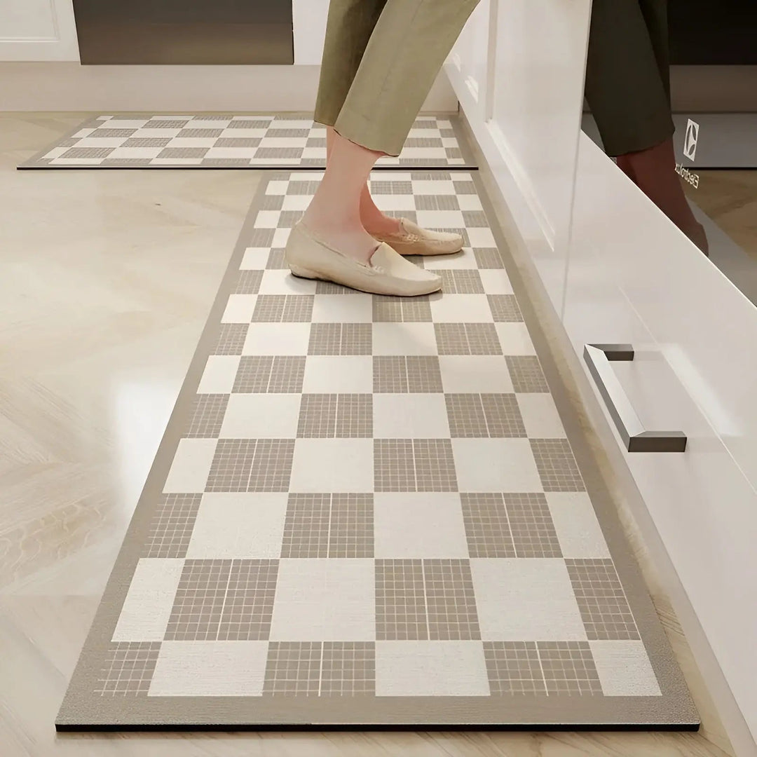 Highly absorbent kitchen mat. Quick-dry PVC non-slip floor mat for maximum spill protection & practical decor.