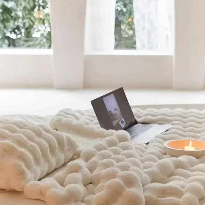 "Ultra-soft faux fur throw blanket, plush texture, beige cream tones, cozy decoration for sofa or bed."