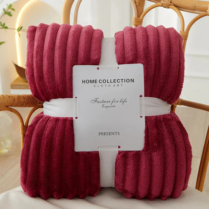 Ultra-soft wide striped flannel throw, ideal for relaxing moments.