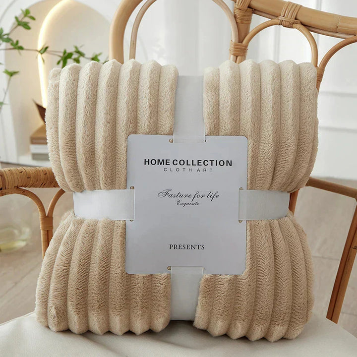 Stylish wide striped fleece blanket, perfect for modern home decor.