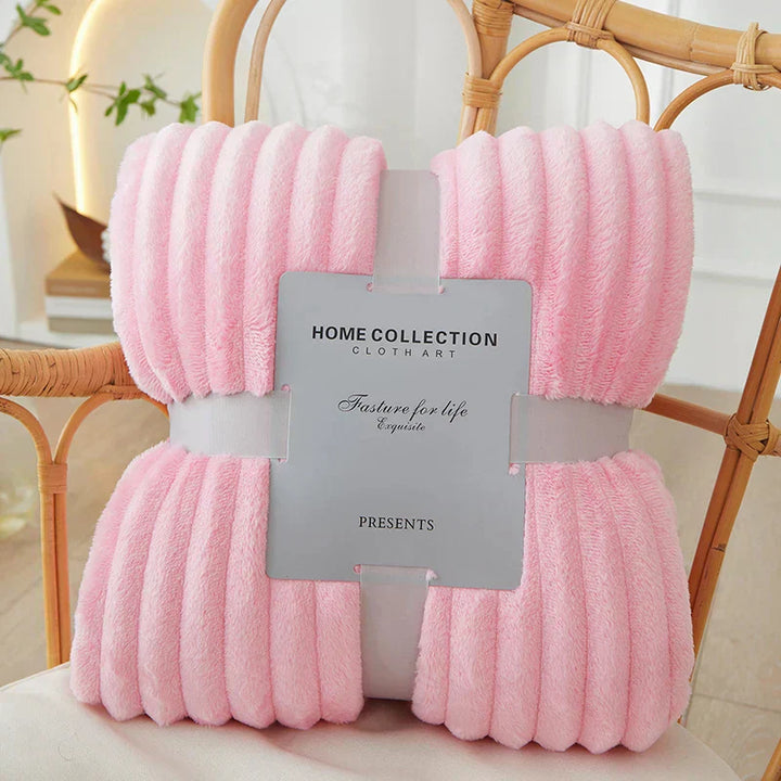 Comforting wide striped throw, a must-have for chilly nights.